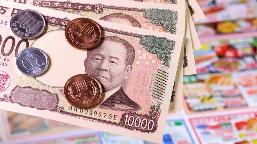 Japanese money and rotating advertisements. Translation: 10,000 yen, Bank of Japan note, Bank of Japan, produced by the National Printing Bureau.