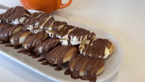 Chocolate banana pancakes Handheld shot banana dessert with nutty, chocolate base and soft creamy topping - Powered by Shutterstock - Get 15% off with code: PIKWIZARD15