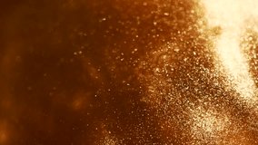 Gold particles floating background, Liquid gold, golden abstract backdrop. Golden abstract backdrop. Beautiful metallic yellow texture, swirls. Metallic paint close-up. Art Wallpaper waves surface.  - Powered by Shutterstock - Get 15% off with code: PIKWIZARD15