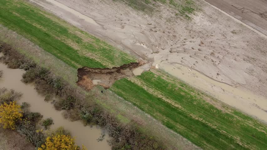 Flooding due to rain and the collapse of the Cadelbosco di Sotto dam, dike, Italiy. High quality 4k footage
