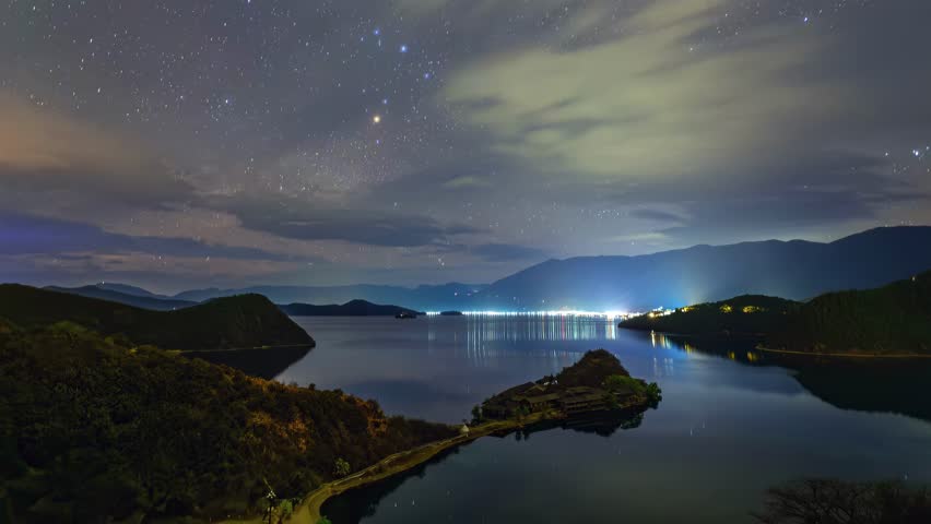 Breaking through clouds to discover a sky full of stars at Lugu Lake