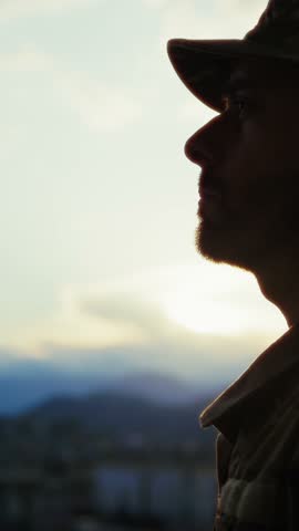 Silhouette Of A Soldier Salutes In Front American Flag At Sunset Memorial Day