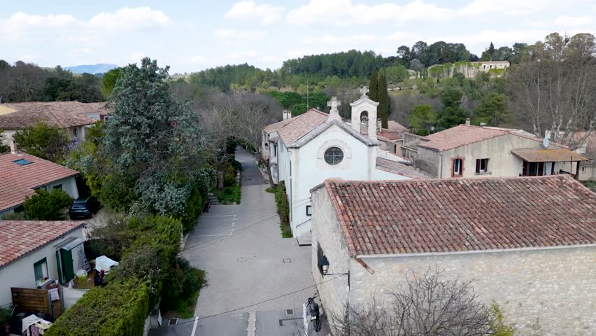 Small community church with bell in a small village of Cazevieille