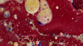 Vertical video. Paint flowing. Colored layered emulsion. Contrast mixing stream. Gel oil dusted glitter. Separated components thick red opaque liquid. Fluid pigment particles. - Powered by Shutterstock - Get 15% off with code: PIKWIZARD15