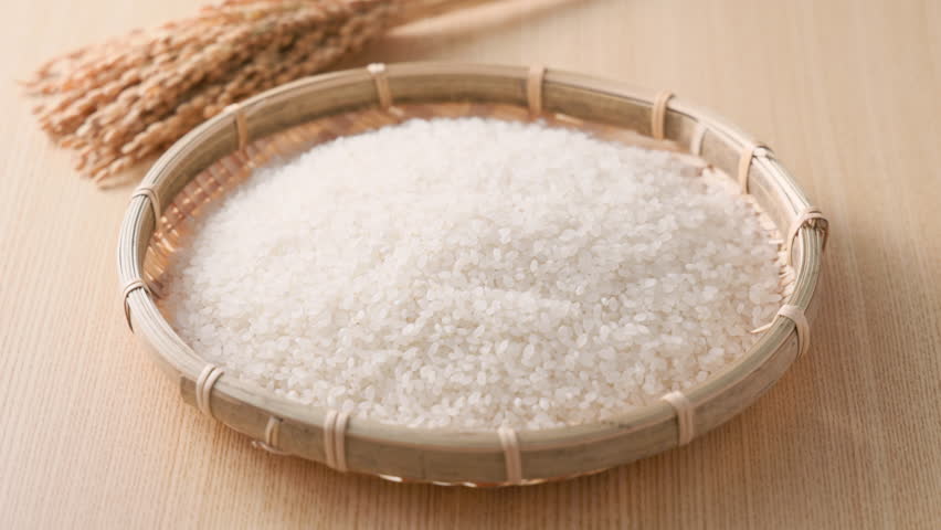 Japanese Raw Rice in a Bamboo Basket – Traditional Asian Food Concept