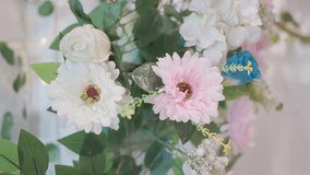 white and pink roses as a wall decoration - Powered by Shutterstock - Get 15% off with code: PIKWIZARD15