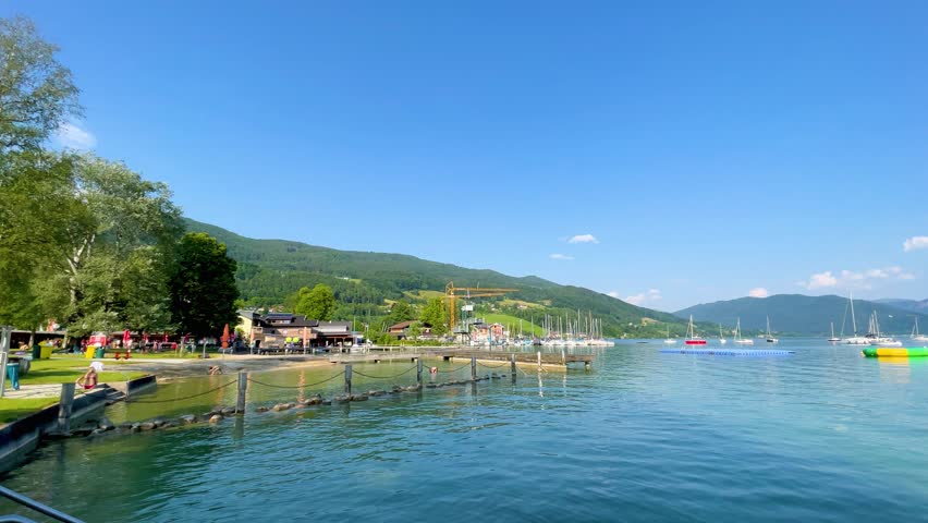 Sunny summer day at the Mondsee, a popular lakeside leisure spot in the town of Mondsee