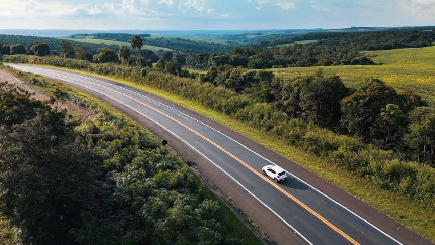 Aerial view of the highway BR277 with cars moving on it. State of Parana, Brazil