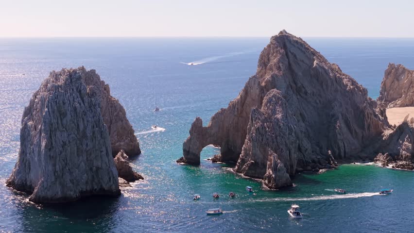 Breathtaking aerial view of iconic natural rock formation El Arco, The Arch, at Land’s End in Cabo San Lucas, Mexico, where the Sea of Cortez meets the Pacific Ocean