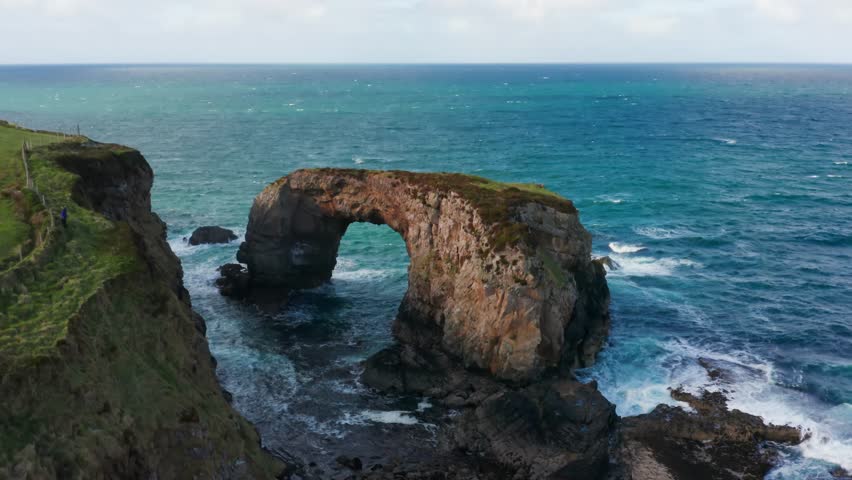 Stunning Aerial of Ireland’s Great Pollet Sea Arch Along the Atlantic