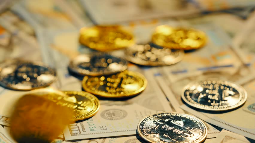 BTC bitcoin spinning on the background of dollar bills - Powered by Shutterstock - Get 15% off with code: PIKWIZARD15