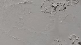 Abstract texture of a white wall with peeling paint due to moisture and aged. Paint chips concepts. - Powered by Shutterstock - Get 15% off with code: PIKWIZARD15