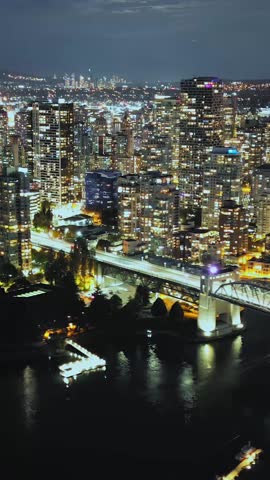 Hyperlapse of downtown of Vancouver at night, Granville bridge and False Creek