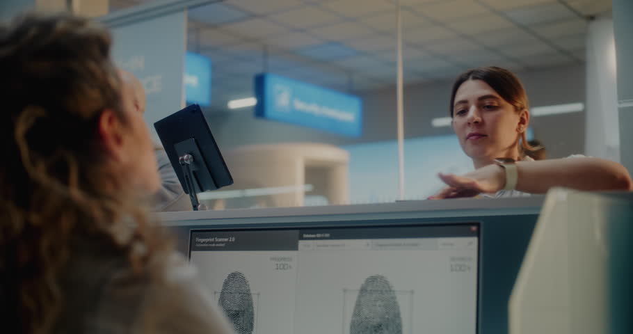 Airport Check-in Counter: Woman Giving Documents and Airplane Ticket to Female Airline Agent for Checking Biometric Data. Passport Control in International Airport Terminal for Boarding Plane Flight.