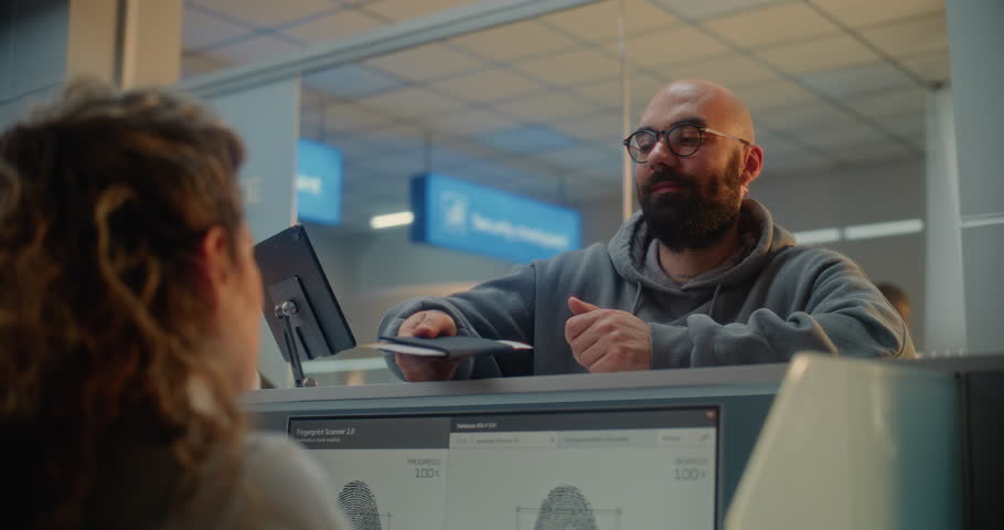 Airport Check-in Counter: Man Giving Documents and Airplane Ticket to Airline Agent, Putting Finger on Touch Screen to Verify Biometric Data by Scanning Fingerprint. Passport Check in Airport Terminal