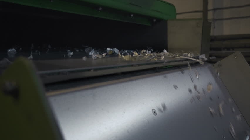 Extruder machine makes plastic granules, recycling polypropylene. Gray or white plastic pellets. Raw material for plastic or Polyethylene products. Garbage factory, waste plant. Recycling industry