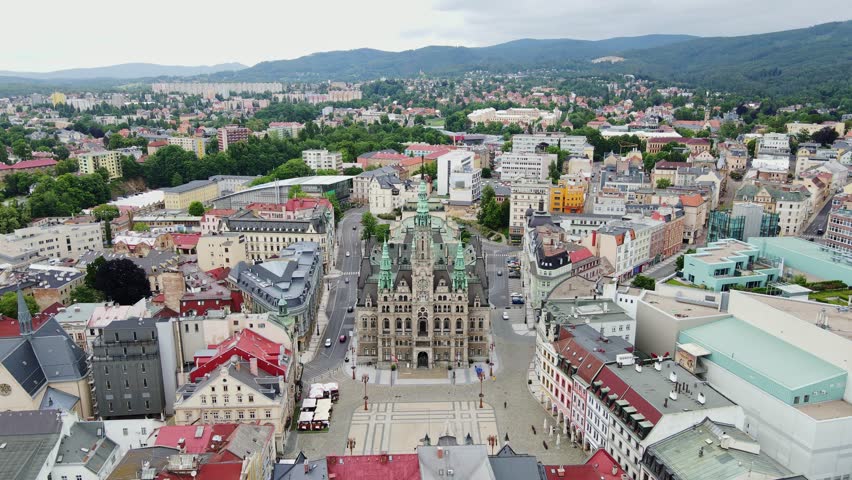 Bird’s-eye perspective of Czech city Liberec with mountains, historical skyline