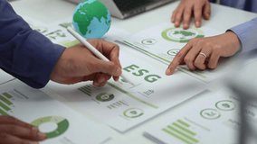 ESG environmental social and governance Green business concept. Business team Meeting carbon credit report, Green investment strategy concept to Sustainable Environment development goal. CSR concept. - Powered by Shutterstock - Get 15% off with code: PIKWIZARD15