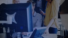 business team analyzing data around computer workstation, displaying animated bar charts. Collaboration, teamwork, data visualization, analytics, digital workspace, modern office, professional - Powered by Shutterstock - Get 15% off with code: PIKWIZARD15