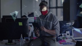 Man using tablet in modern tech office, displaying rotating digital globe with network data. Technology, connectivity, digital, professional, workspace, communication, innovation - Powered by Shutterstock - Get 15% off with code: PIKWIZARD15