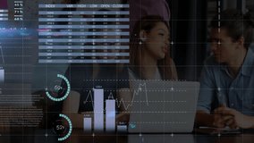 Two coworkers working on finance showing animated overlays with pie charts bar graphs in office. Collaboration, data visualization, analytics, teamwork, business, professional, modern - Powered by Shutterstock - Get 15% off with code: PIKWIZARD15