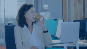 Businesswoman holding coffee and interacting with floating social media icons in marketing office. Professional, modern, vibrant, technology, communication, workspace, productivity - Powered by Shutterstock - Get 15% off with code: PIKWIZARD15