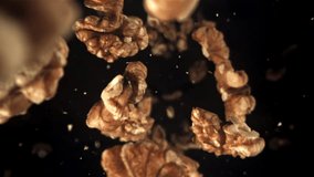 Walnuts fly down. Filmed on a high-speed camera at 1000 fps. High quality FullHD footage - Powered by Shutterstock - Get 15% off with code: PIKWIZARD15
