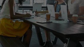 Team analyzing financial data on laptops in meeting room, showing animated candlestick charts. Office, collaboration, technology, finance, analysis, business, modern - Powered by Shutterstock - Get 15% off with code: PIKWIZARD15