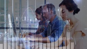 Team typing, smiling, leaning at desk in office, with animated finance charts overlaying monitor. Collaboration, teamwork, modernity, productivity, technology, analytics, corporate - Powered by Shutterstock - Get 15% off with code: PIKWIZARD15