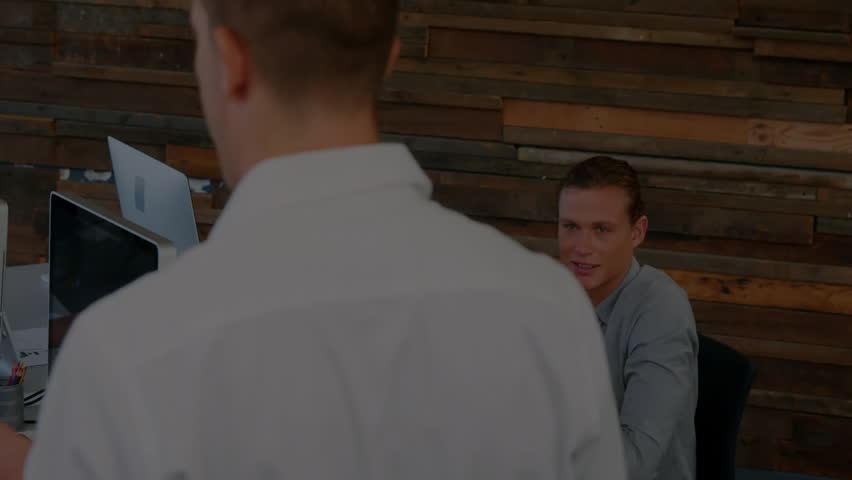 team reviewing financial reports in office, displaying live stock ticker symbols and line graphs. Collaboration, teamwork, analytics, finance, technology, professional, modern - Powered by Shutterstock - Get 15% off with code: PIKWIZARD15