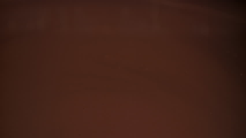 Melted liquid chocolate. Filmed on a high-speed camera at 1000 fps. High quality FullHD footage