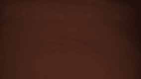 Melted liquid chocolate. Filmed on a high-speed camera at 1000 fps. High quality FullHD footage - Powered by Shutterstock - Get 15% off with code: PIKWIZARD15