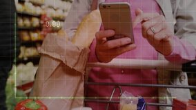 Woman holding smartphone and grocery bag in supermarket aisle, tracking retail sales graph data. Analytics, technology, retail, shopping, trend, modern, consumer - Powered by Shutterstock - Get 15% off with code: PIKWIZARD15