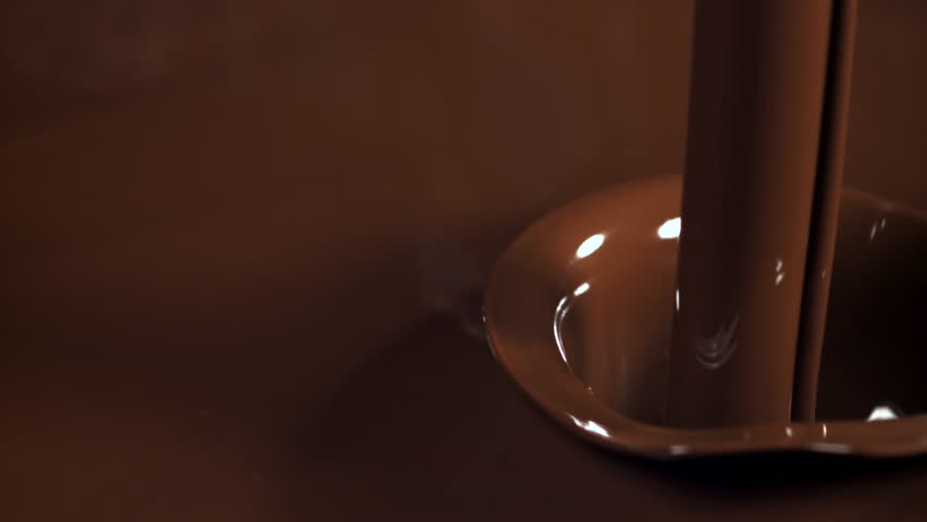 Melted liquid chocolate. Filmed on a high-speed camera at 1000 fps. High quality FullHD footage