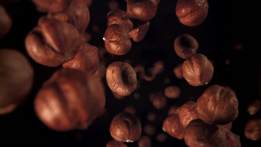 Hazelnuts fall down. Filmed on a high-speed camera at 1000 fps. High quality FullHD footage