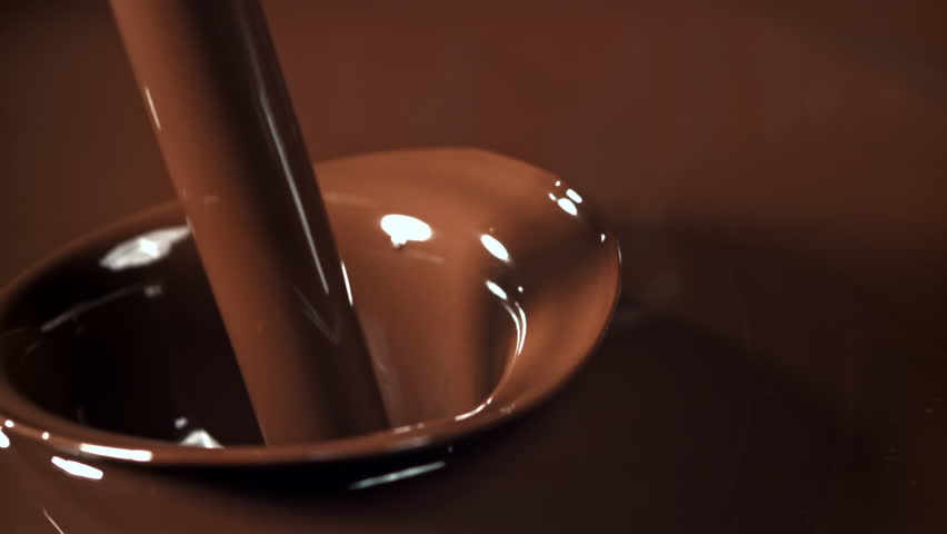 Melted liquid chocolate. Filmed on a high-speed camera at 1000 fps. High quality FullHD footage