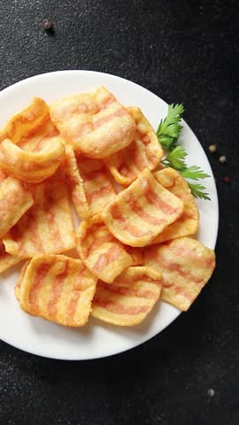 Chips bacon crispy rashers corn tasty snacks fast food natural food fresh dish on the table rustic food top view copy space