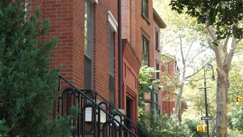 New York City townhouse building, Brooklyn Heights residential district, USA. Brownstone urban architecture, attached house. United States real estate, american property, apartments and homes in NYC.