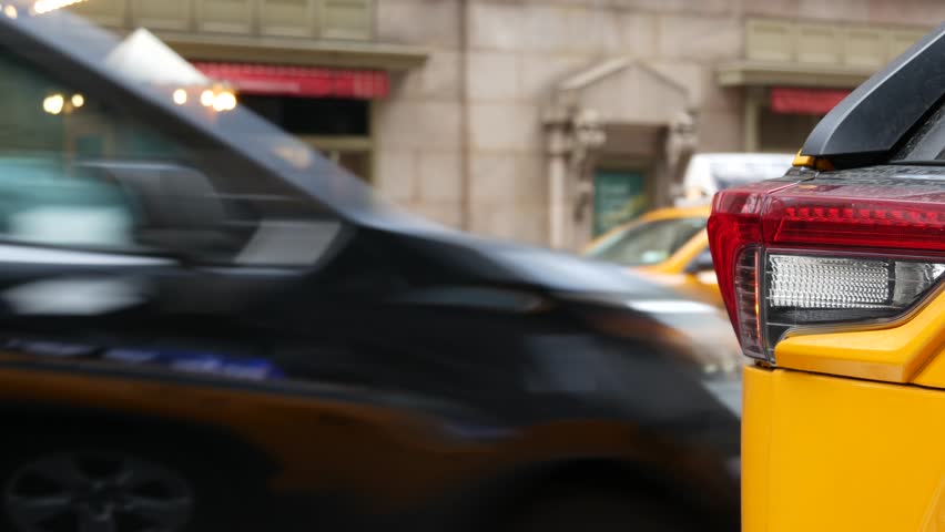 New York City Grand Central Terminal railway station, 42 street. Manhattan Midtown. Yellow taxi cabs, car transport on Pershing Square, NYC USA. American urban road traffic, people,telephone box kiosk