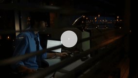 Man coding in night office, showing floating smartphone icons and glowing Wi-Fi lines for tech. Technology, innovation, digital, networking, professional, modern, connectivity - Powered by Shutterstock - Get 15% off with code: PIKWIZARD15