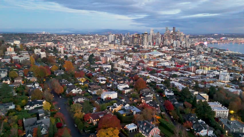 Daytime Aerial Panorama of Seattle Skyline with Iconic Space Needle and Waterfront. Top cinematic aerial view. Washington USA