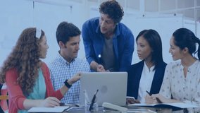 Business team collaborating over laptop in modern office, with floating network icons. Professional, teamwork, innovation, connectivity, modern, workspace, productivity - Powered by Shutterstock - Get 15% off with code: PIKWIZARD15