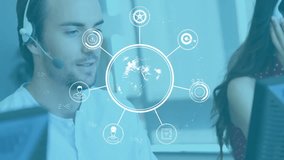 Male agent speaking at call center desk, showing floating blue icons of globe phone lock. Technology, communication, teamwork, digital, professional, collaboration, innovation - Powered by Shutterstock - Get 15% off with code: PIKWIZARD15