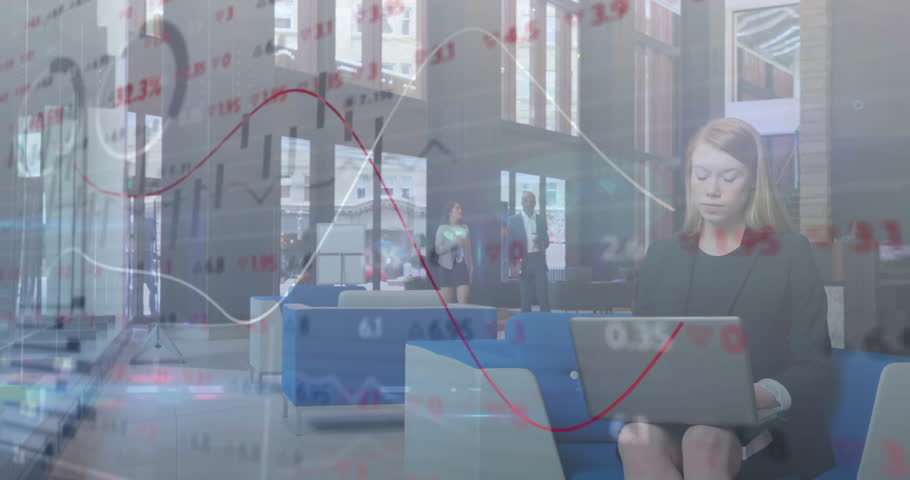 Woman focusing on laptop in modern office lounge, showing floating red and white finance charts. Collaboration, innovation, urban, contemporary, technology, teamwork, professional