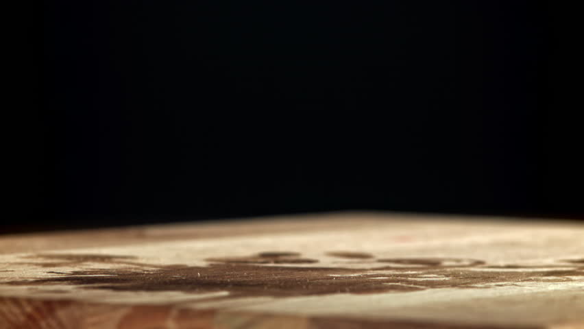 Sliced cucumbers fall on the table. Filmed on a high-speed camera at 1000 fps. High quality FullHD footage
