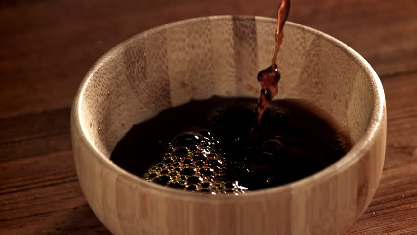 Soy sauce is poured into a gravy boat. Filmed on a high-speed camera at 1000 fps. High quality FullHD footage