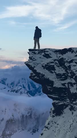 3D Rendering: Hiker on Snowy Mountain Cliff Edge Overlooking Scenic Winter Landscape