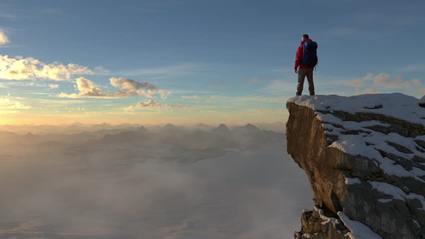 Hiker on Snowy Mountain Cliff Edge at Sunset: A 3D Rendering