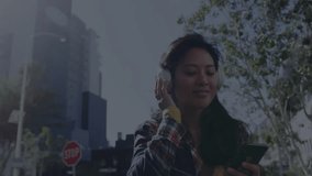 Woman adjusting headphones on street corner, showing floating finance charts and candlestick graphs. Urban, casual, vibrant, modern, technology, communication, lifestyle - Powered by Shutterstock - Get 15% off with code: PIKWIZARD15