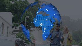 Man pointing ahead and woman holding coffee cup walking down urban street with tech globe overlay. Urban, friendship, exploration, connectivity, modern, casual, suburban - Powered by Shutterstock - Get 15% off with code: PIKWIZARD15
